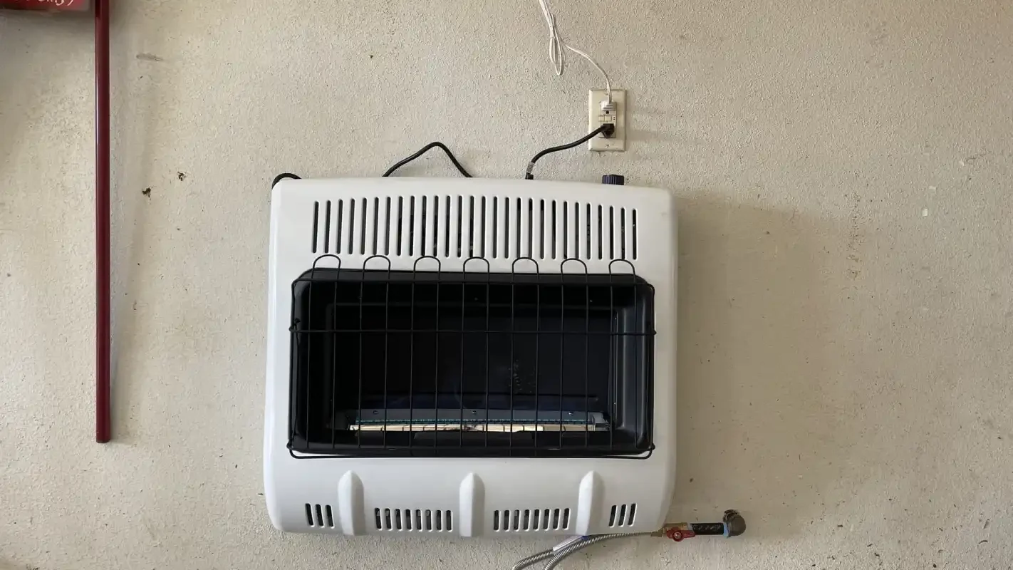 Wall-mounted vented gas heater with supply line