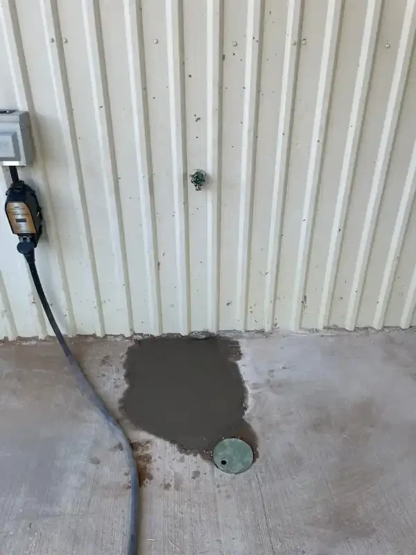 Shop slab with cleanout and water line stub-up